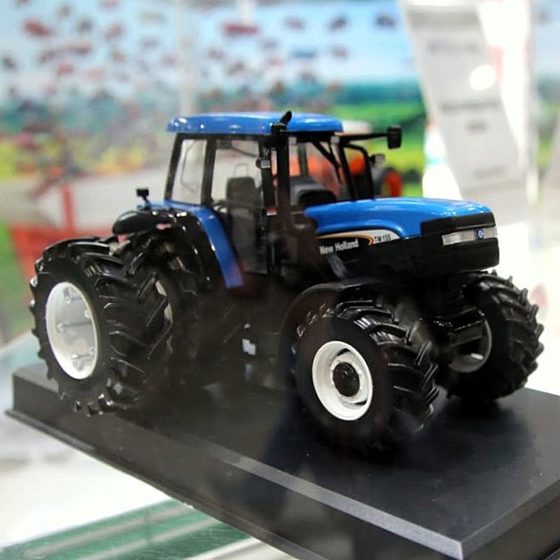 Replicagri 2026 - New Holland TM155 (2002-2005) met afneembare Dubbellucht en Fronthef