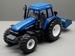 Replicagri - New Holland 8360 + Godet hydraulique bleu 1:32